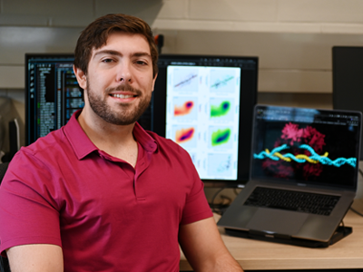 Tyler Browne, PhD candidate, in the computer lab