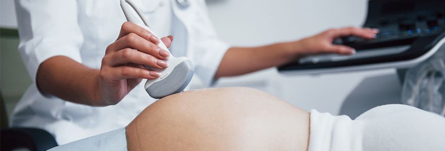 Pregnant women receiving an ultrasound