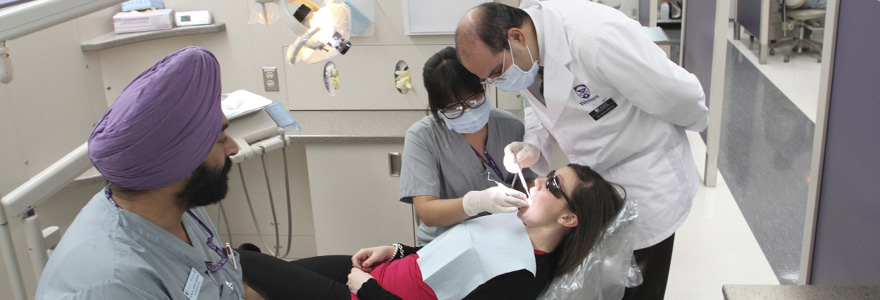 Working with dental patient in the main adult clinic