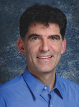 head and shoulders photo of Dr. Rader
