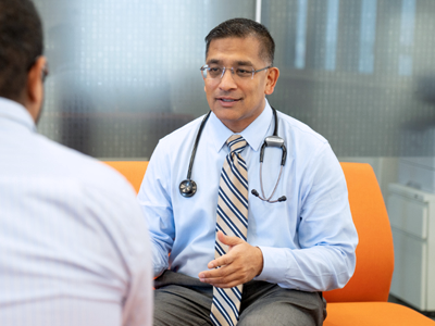 Dr. Amit Garg with patient