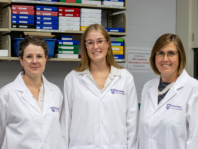 Emma Punkari, Cheryle Seguin and Lauren Flynn in the lab