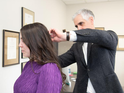 Dr. David Steven with patient