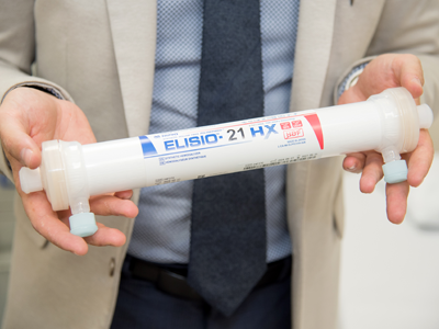 Dr. Roshanov holding one of the dialysis filters