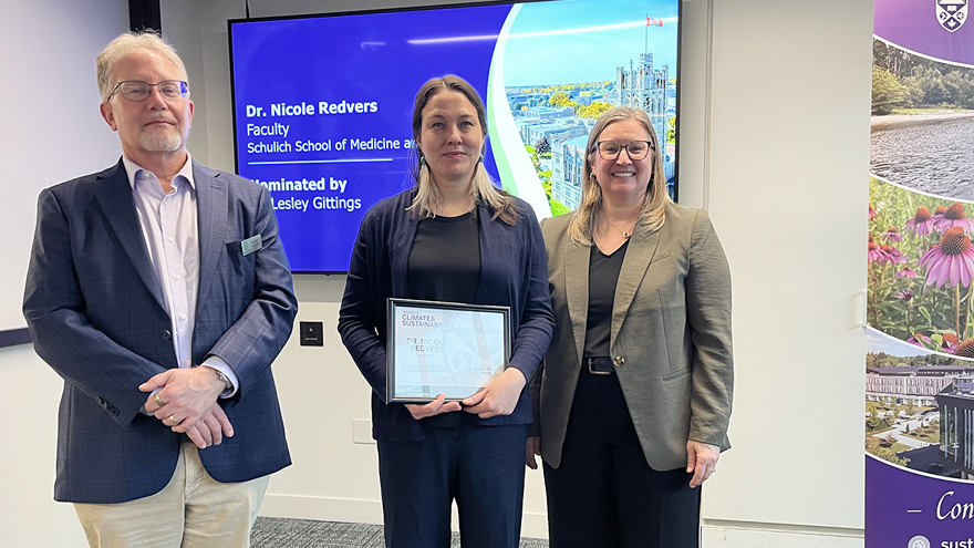 Nicole Redvers receiving her award