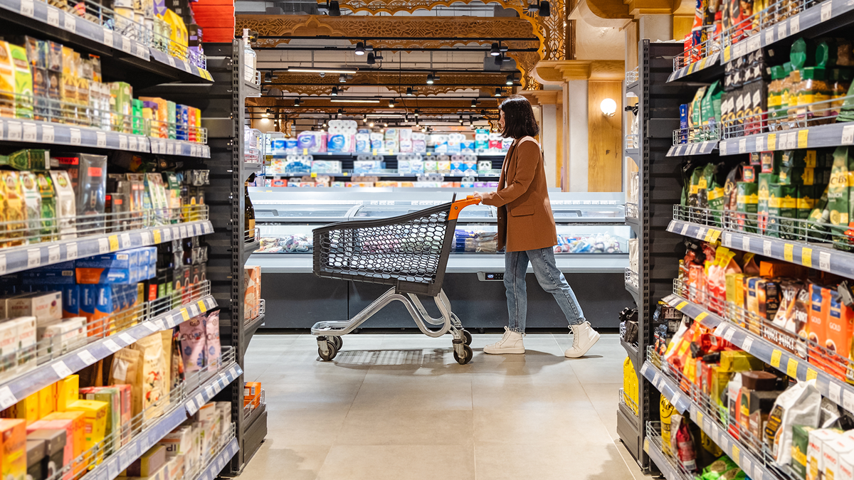 Woman walking through grocery store