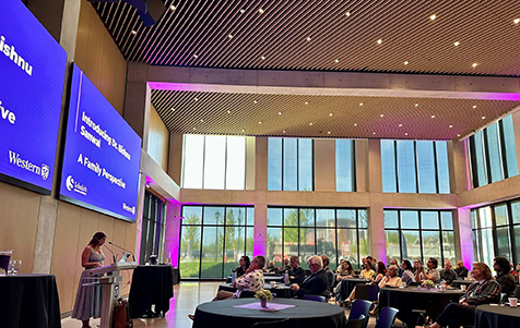 photo of Dr. Sanwal's granddaughter speaking at Sanwal Lecture