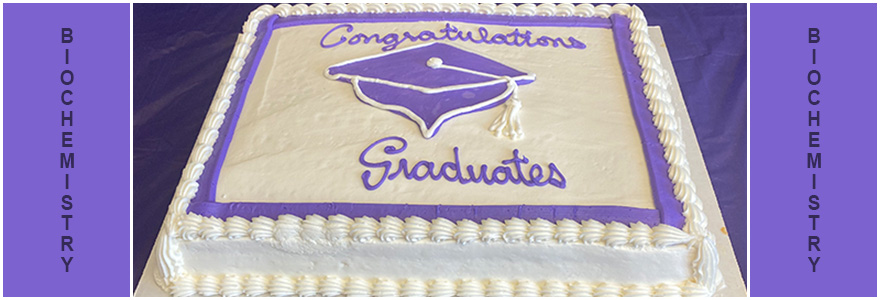 picture of a cake with the words "Congratulations Graduates"