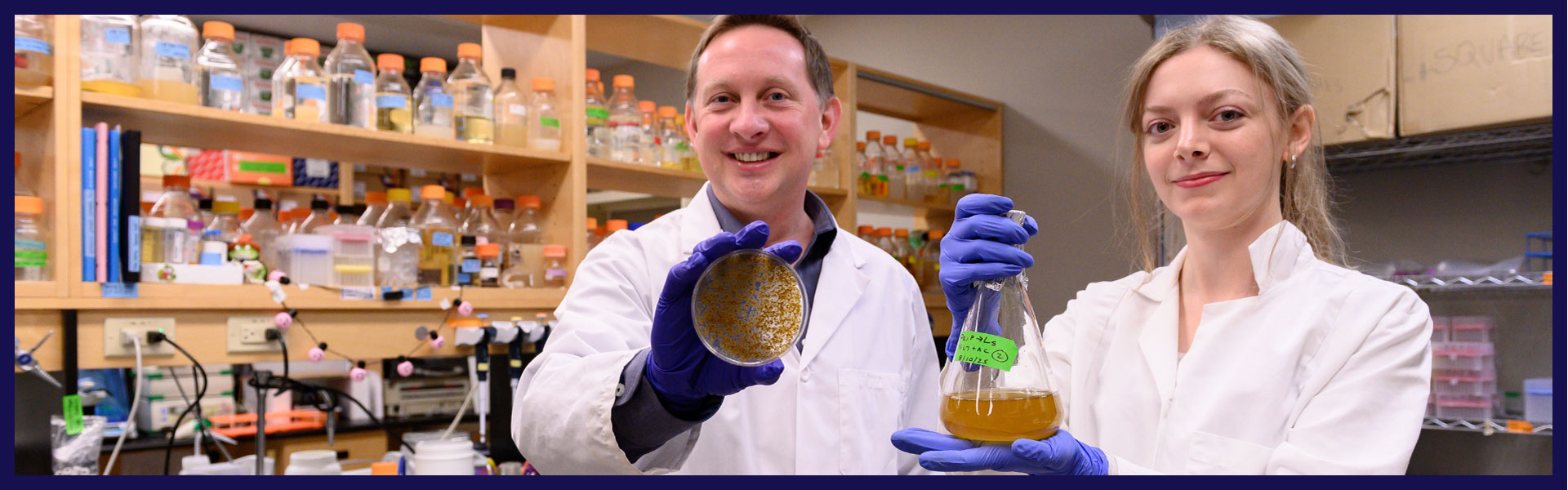 picture of Dr. Karas and Dr. Walker in research lab