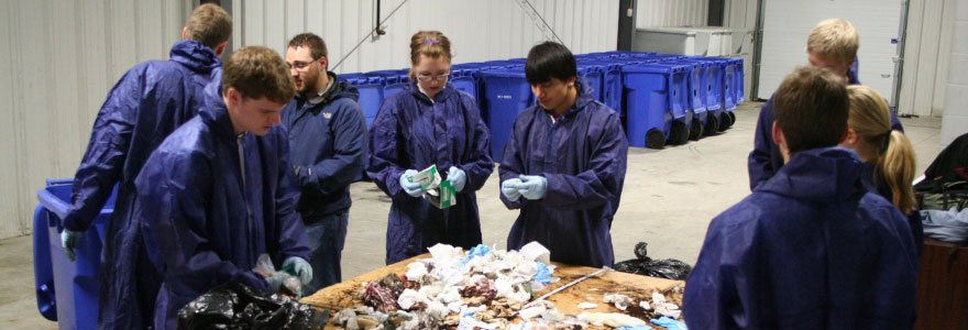picture of people sorting through garbage
