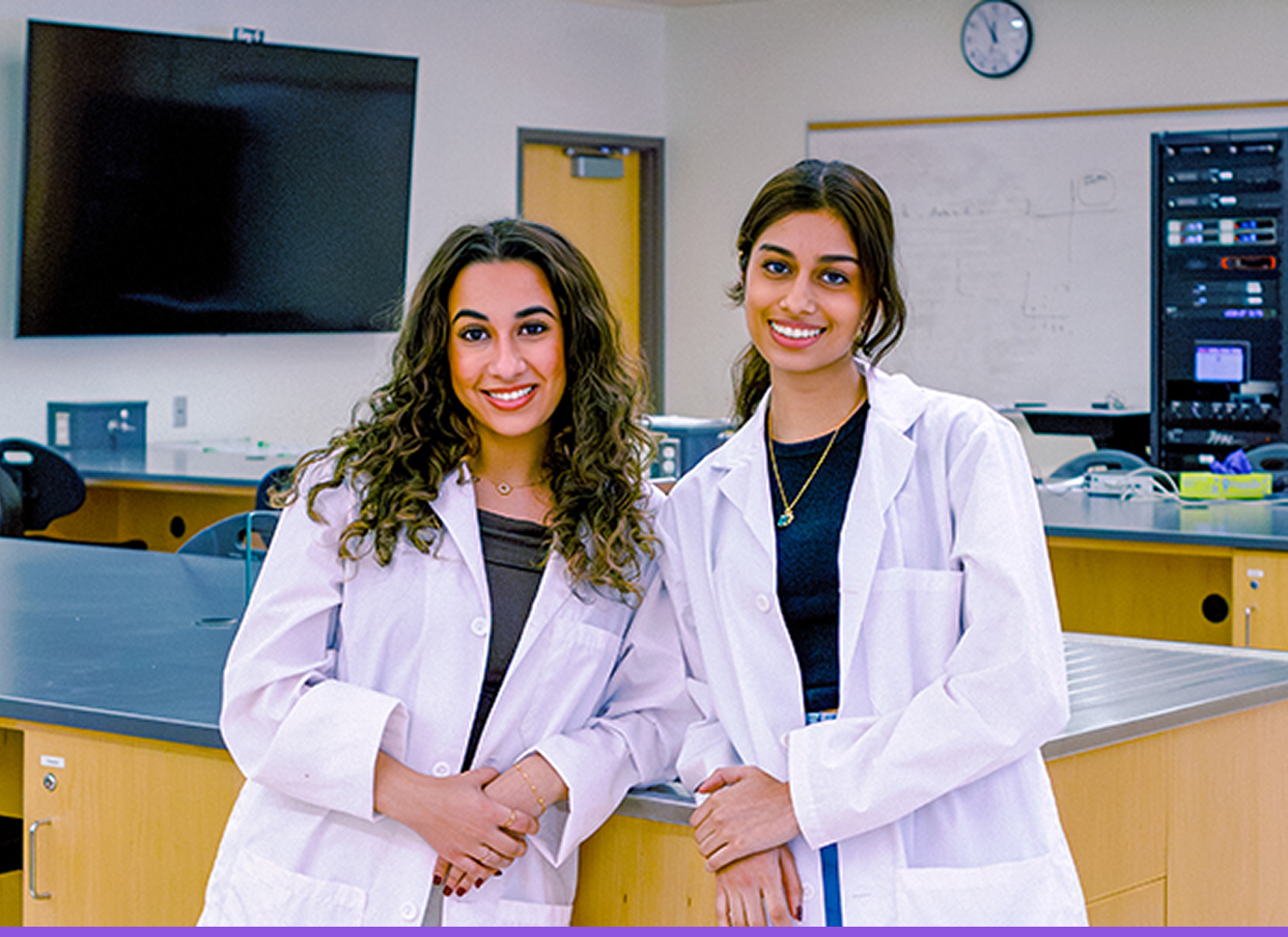 Group of medical trainees listening to a lecture.