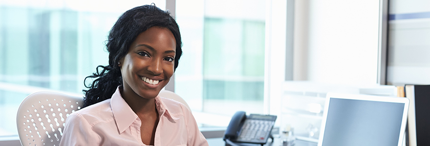 Photograph of female doctor working in office