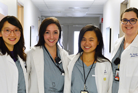 Photograph of four residents in the hospital