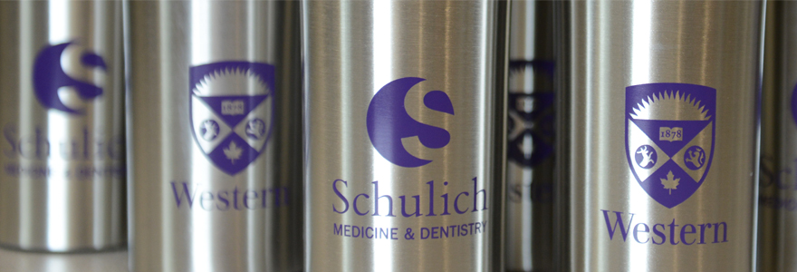 Image of coffee tumbles with the Schulich Medicine & Dentistry and Western logos