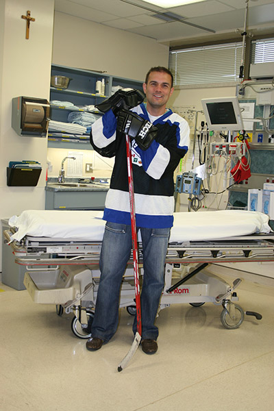 Photo of Dr. Gord Vail in hockey jersey