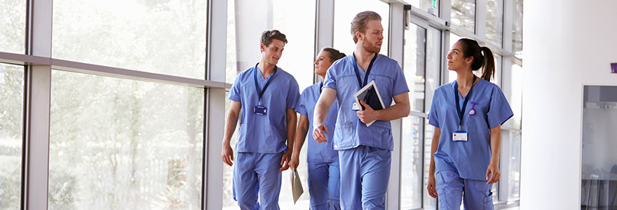 healthcare providers walking with books