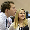 An image of students examining a poster at London Health Research Day