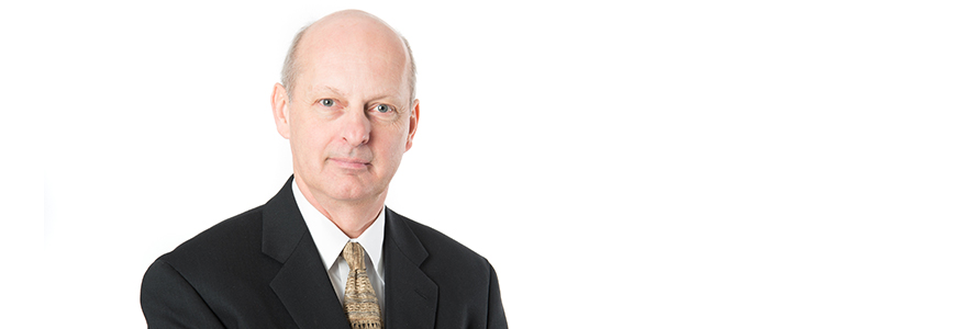 Dr. John Denstedt headshot photo