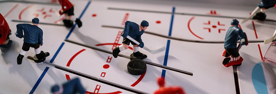 Image of toy hockey players in table hockey game