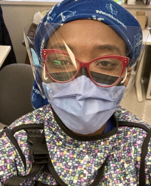 Dr. Viwe Mtwesi with mask on in clinic