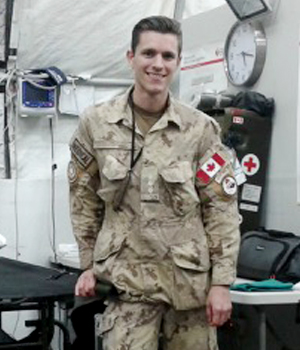 Dr. Curtis Van Doormaal in a military medical tent