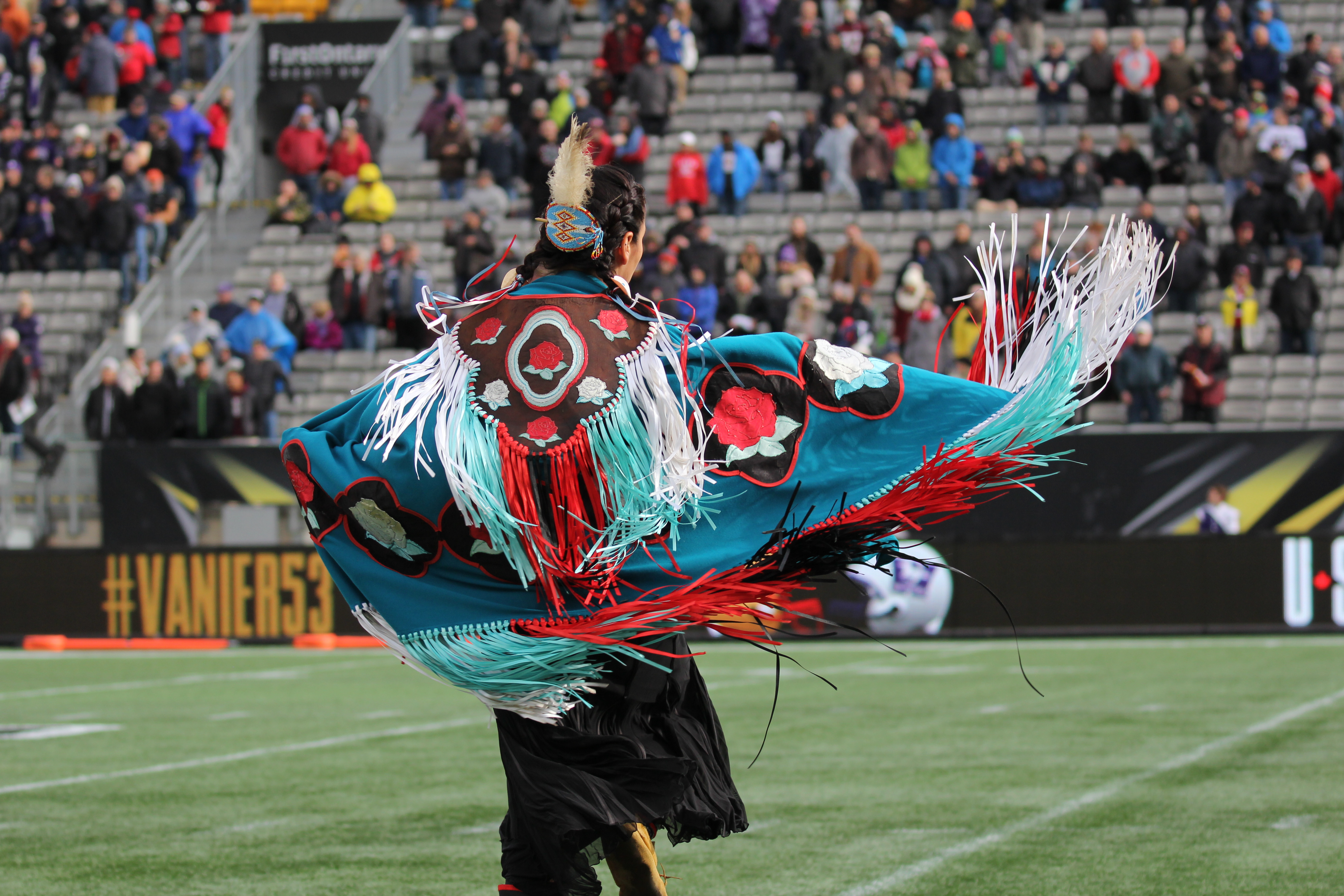 indigenous dancer in traditional regalia