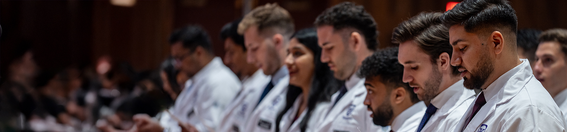 UME Students in white coat