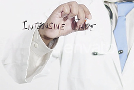 Physician writing Intenstive Care on a white board