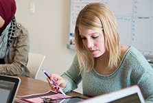 Students of the Master of Public Health Class of 2015 discuss real-world cases in a small group environmentMaki