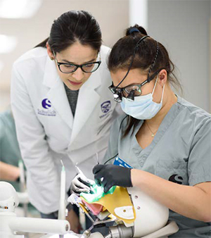 Dentistry student working in the simulation lab