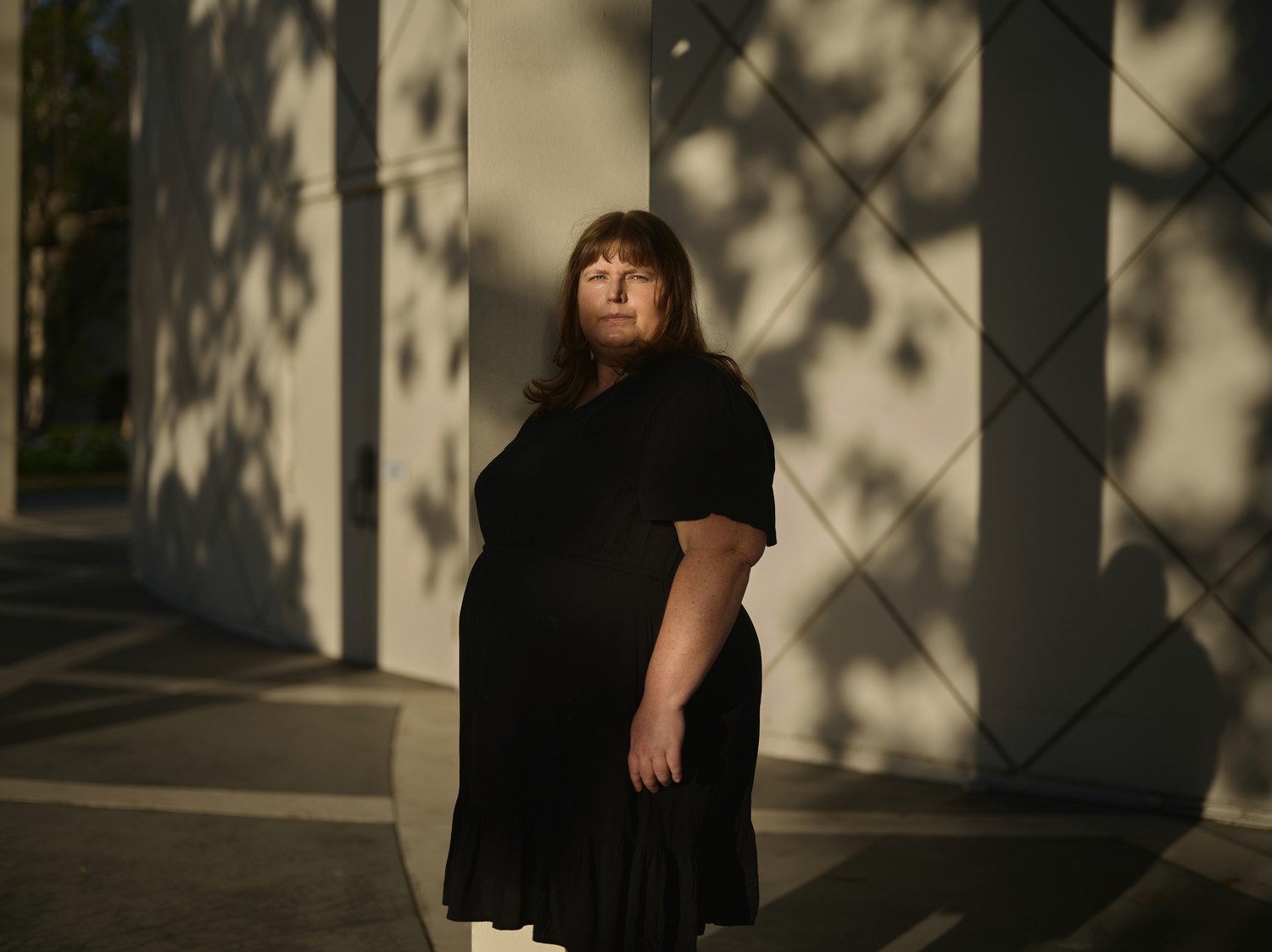 Camilla Urbaniak, PhD'16, standing on Western's campus