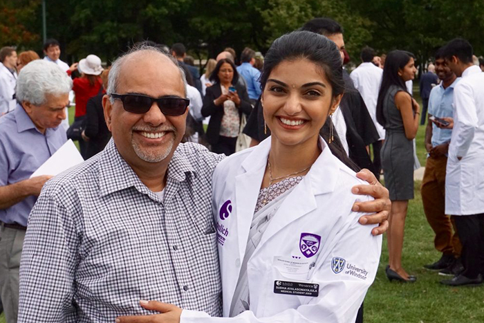 Image of Dr. Ayalasomayajula and her father at her White Coat ceremony