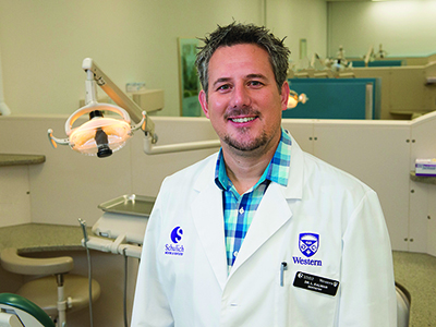 Photograph of Dr. Les Kalman in the dental clinic