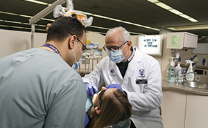 Dental students working in the dentistry clinic