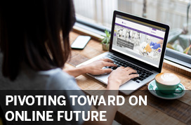 Photograph of student working on a laptop